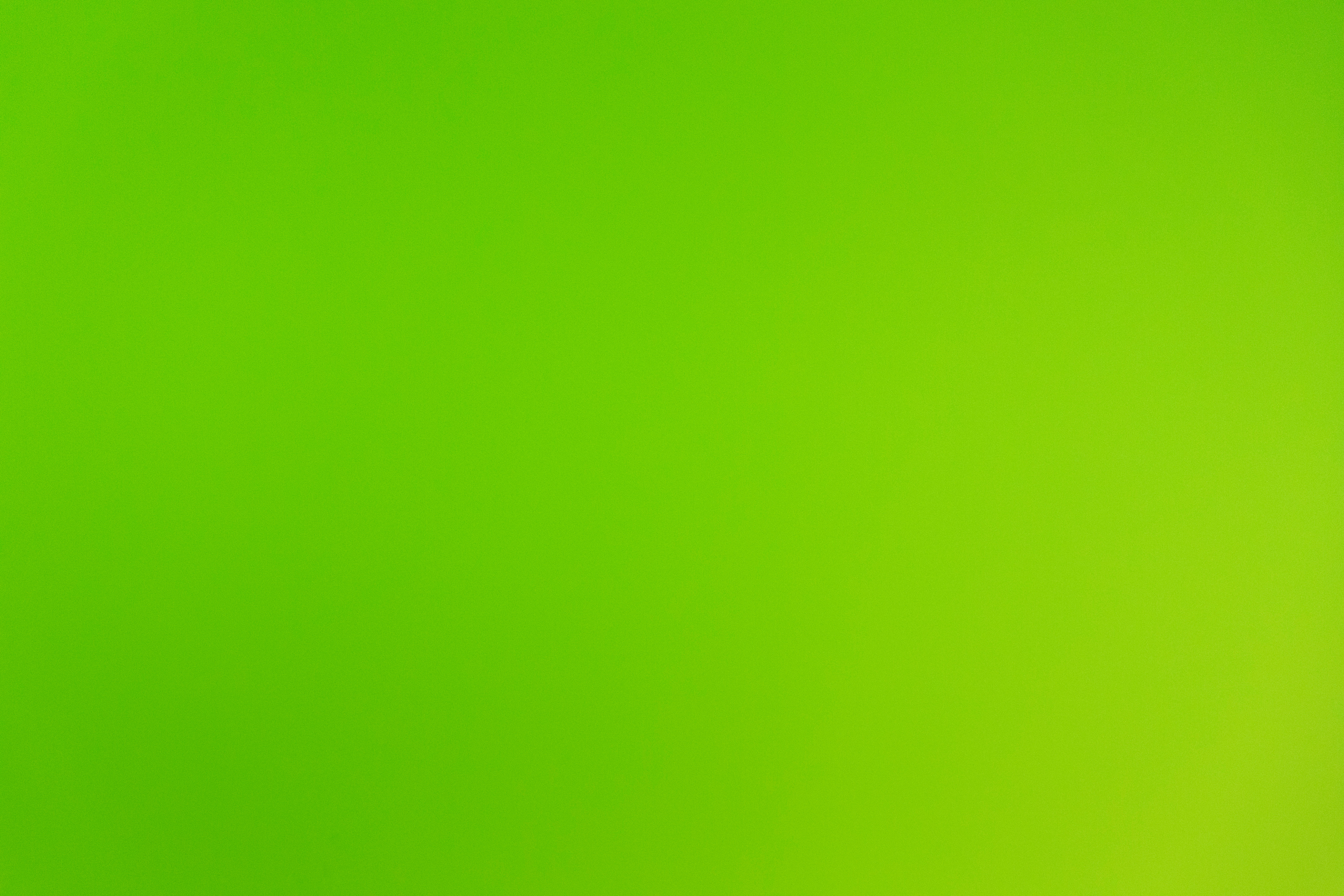 intensive neon green background at a wall